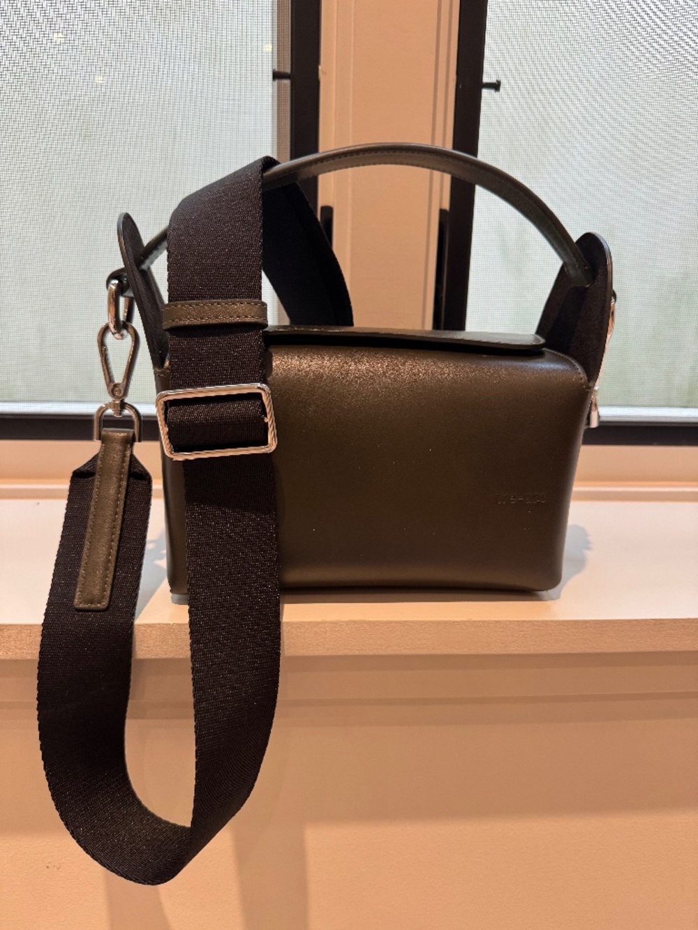 Women’s Black Crossbody Bag with Subtle Embossed Logo